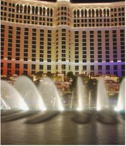 Bellagio fountains with hotel in the background at night, epitomizing the vibrant city where Kevin R. Hansen's law firm provides expert Wills and Trusts legal services