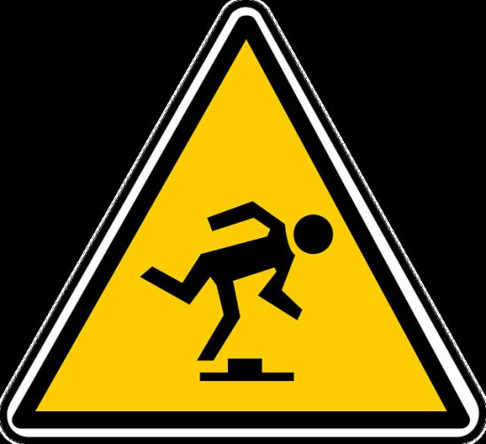 Icon sign of a man tripping over an obstacle, symbolizing the slip and fall accident cases expertly handled by Kevin R. Hansen, Las Vegas Personal Injury Lawyer